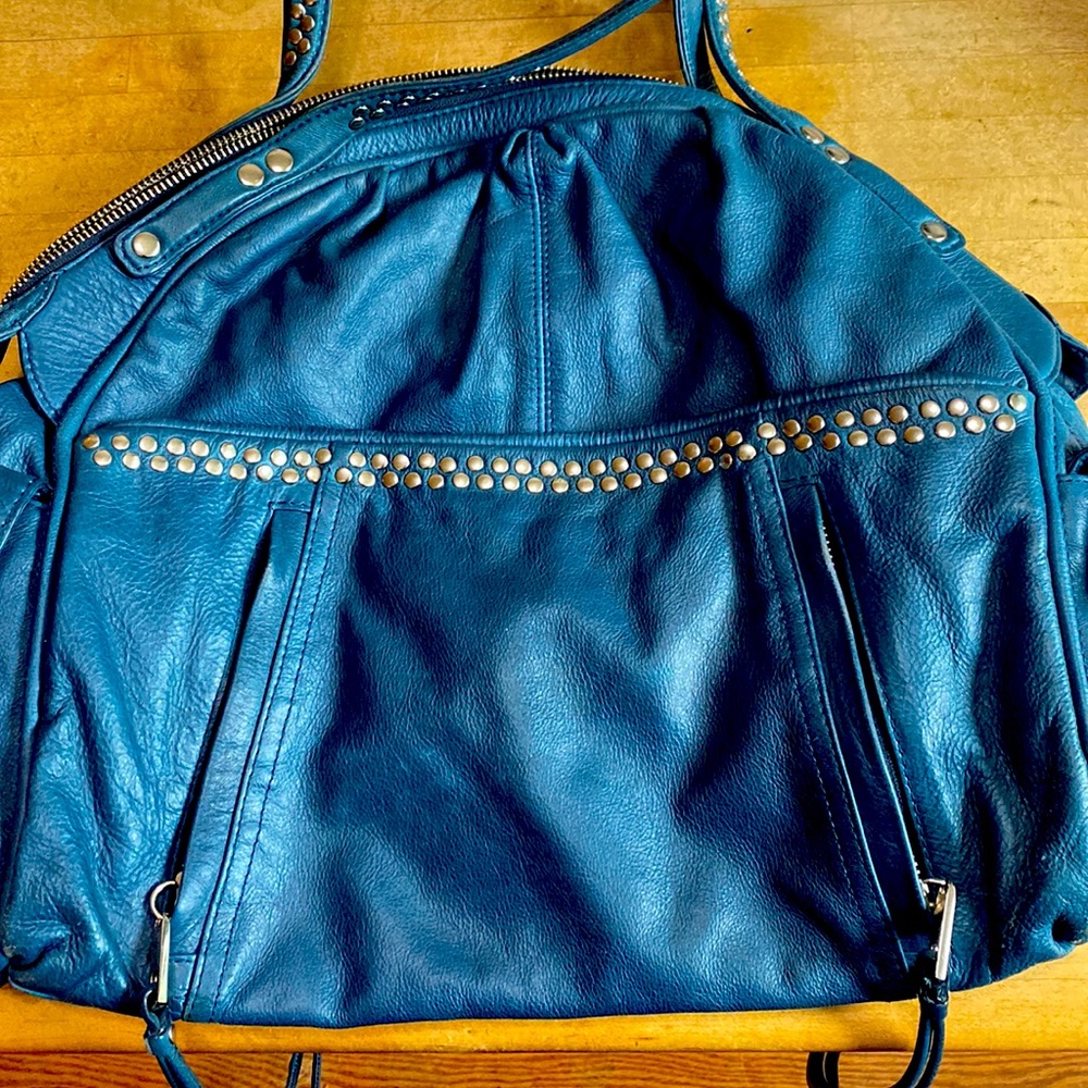 Large leather purse by Junior Drake